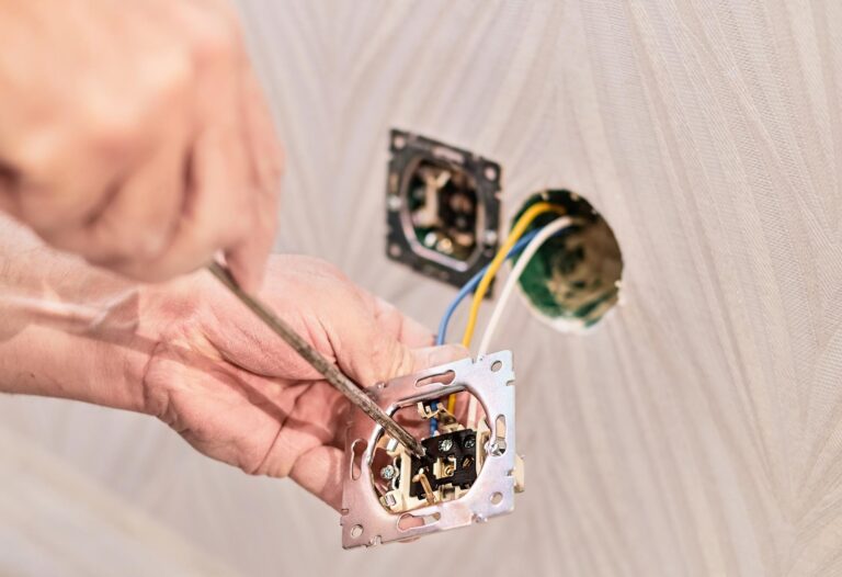 hands-electrician-installing-electrical-outlet-new-house-assembly-electrical-network-room-installation-electrical-network
