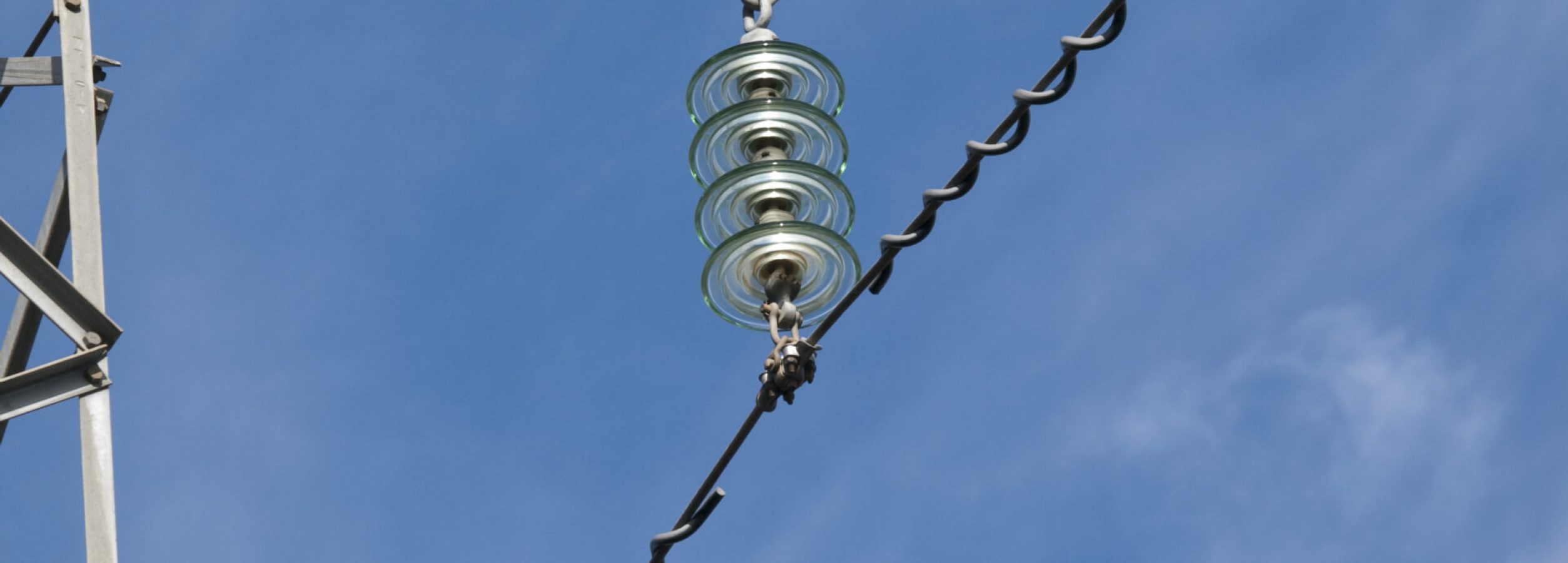 High Voltage Power line High Voltage Power line detail view on sunny day